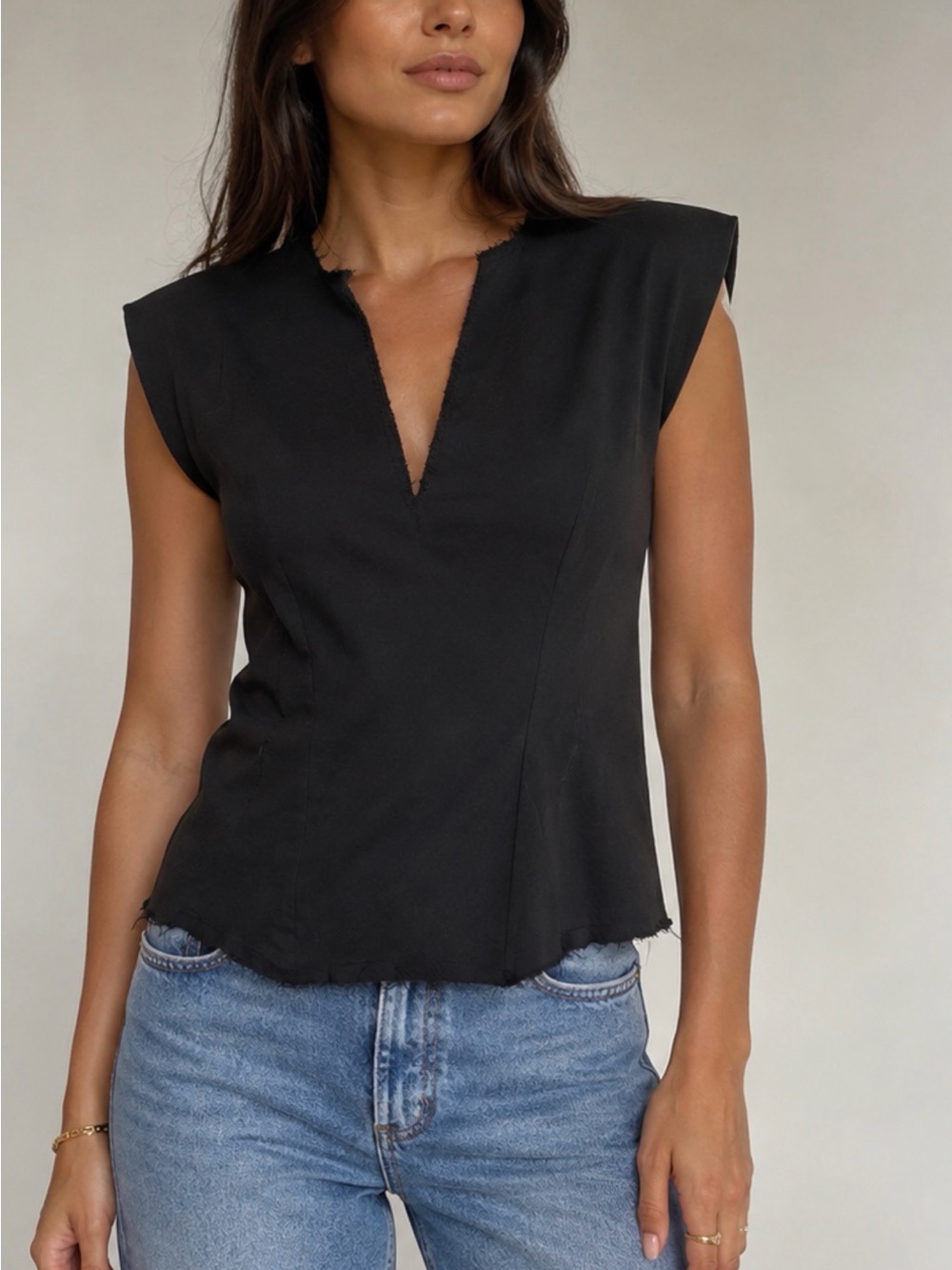Zara Vneck shoulder padded distressed hem black top size small